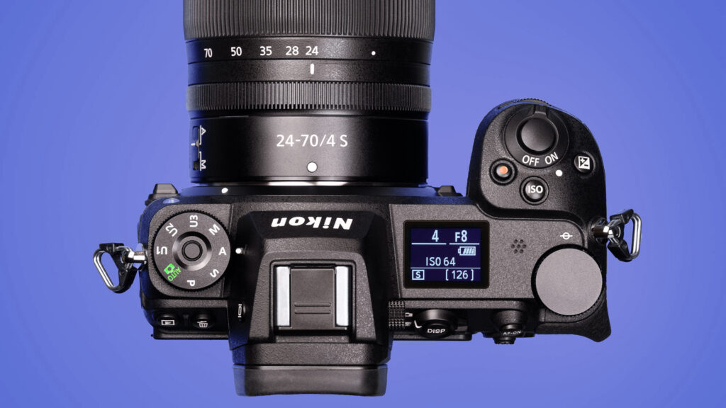 Top view of a Nikon mirrorless camera showing aperture, shutter speed, and ISO settings.