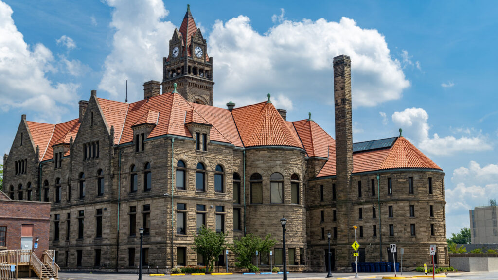 Exterior of a courthouse photographed from a public street with clean architectural lines and no people