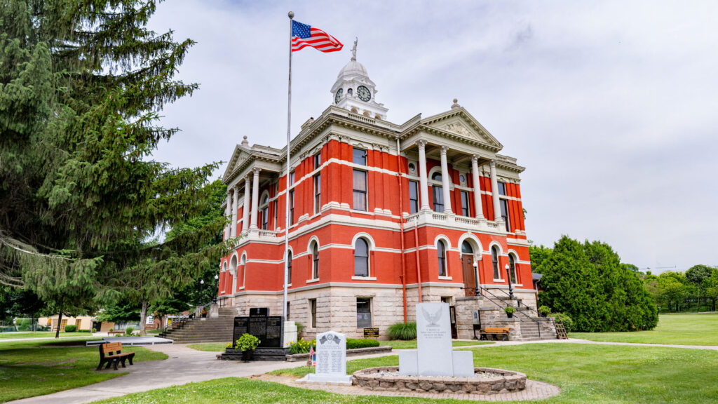 Historic courthouse photographed in everyday public conditions with natural light and surrounding civic space