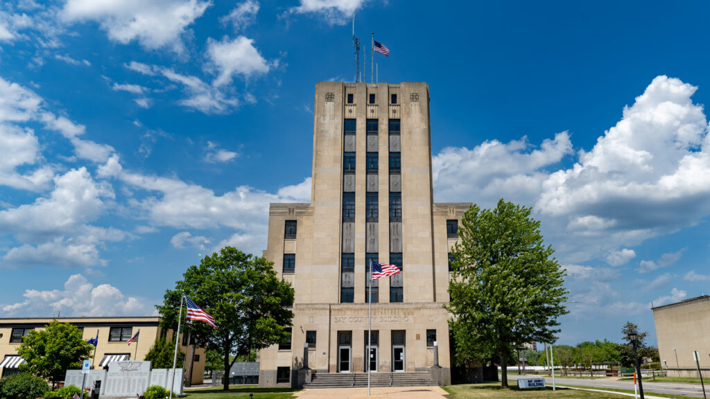 Vertical architecture photography of Bay County building emphasizing height and symmetry